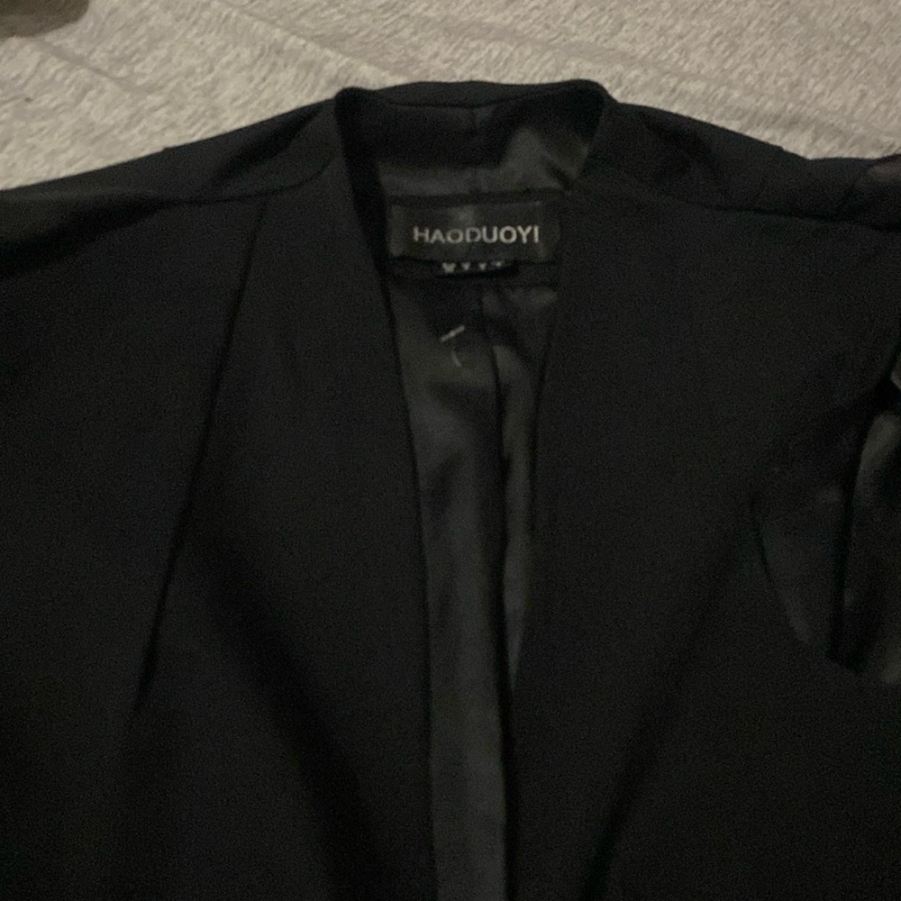 Black sleeveless cape/jacket!  Haoduoyl designs.